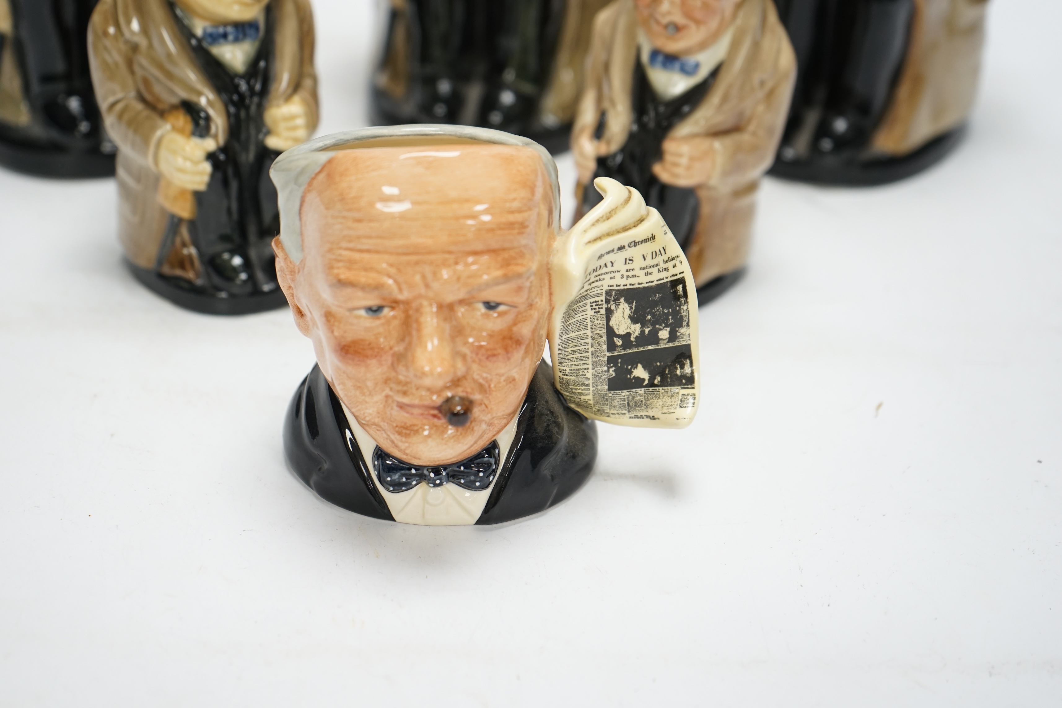 A group of six Doulton Winston Churchill character jugs, largest 23cm high. Condition - good, some crazing